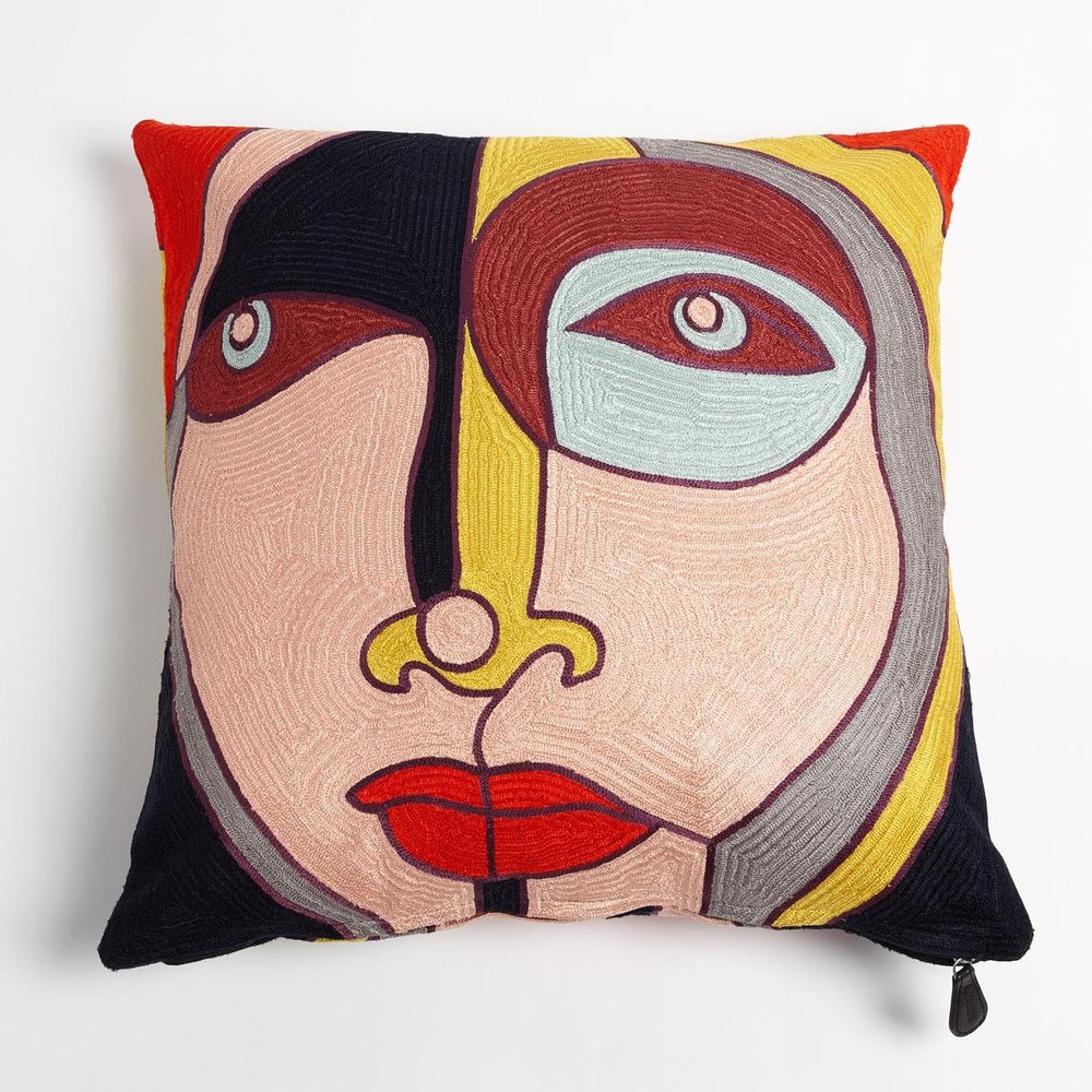 Paloma Pillow, shown in peach and yellow with textile, embroidery thread, and removable cover with zipper closure.