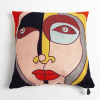 Paloma Pillow, shown in peach and yellow with textile, embroidery thread, and removable cover with zipper closure.