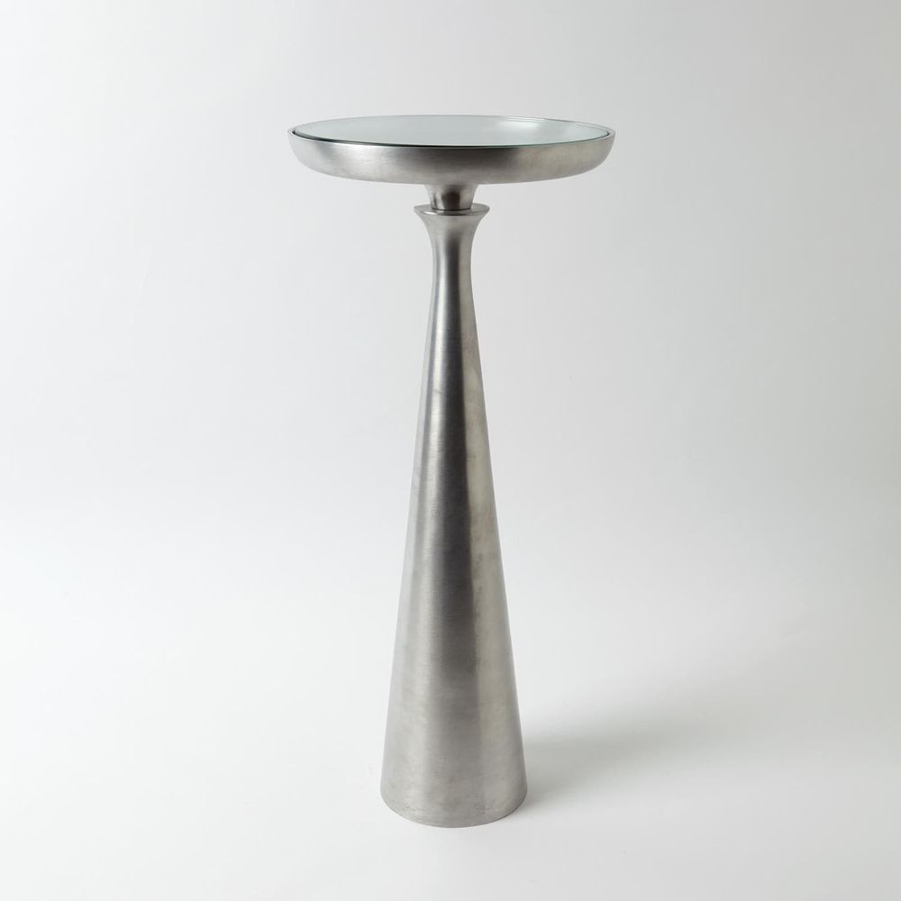 Minaret Accent Table, shown in brushed silver and cool gray with metal, glass, and a round inset glass top surface.