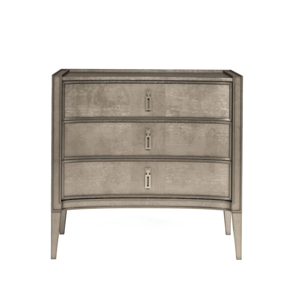 Cove Nightstand, shown in pewter and warm gray with wood, metal hardware, and three full-width drawers.