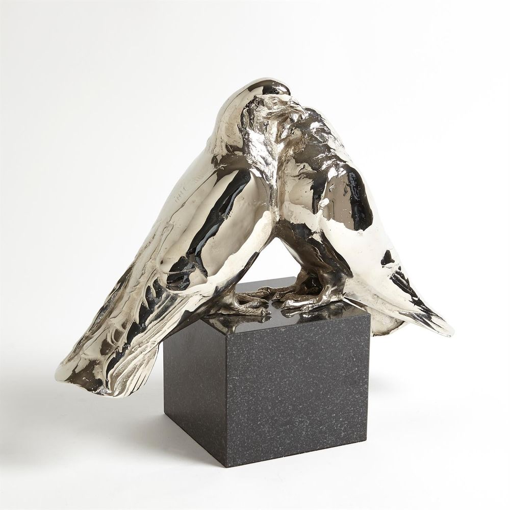Love Doves, shown in silver and gold with polished metal, stone, and freestanding sculptural form.