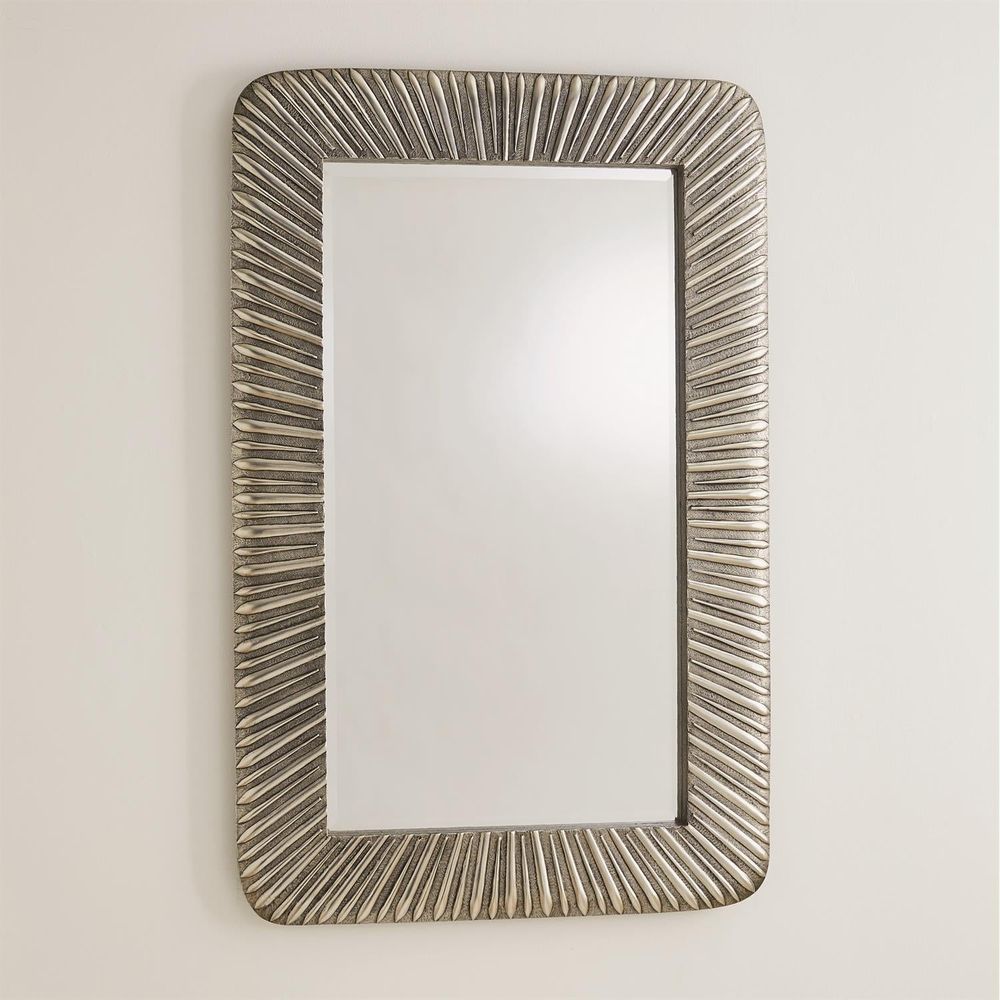 Valencia Mirror, shown in antique silver and warm gold with glass, resin, and wall-mounting design.