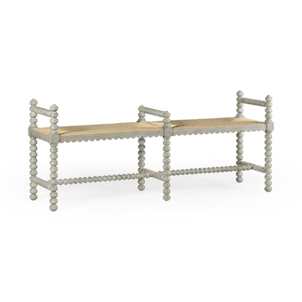 Bellingham Country Grey Bench, shown in soft grey with wood, woven rush, and fixed low open arms.