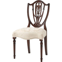 The Hidden Vase Side chair, shown in dark walnut brown and ivory cream with wood, upholstery fabric, and armless open back.