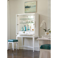 Additional view of Elmhurst Bar in white and alabaster, featuring painted finish and geometric fretwork bifold doors.