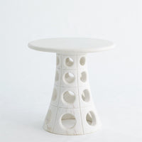 Taper Circle Side Table, shown in white and ivory with marble and fixed pedestal base.