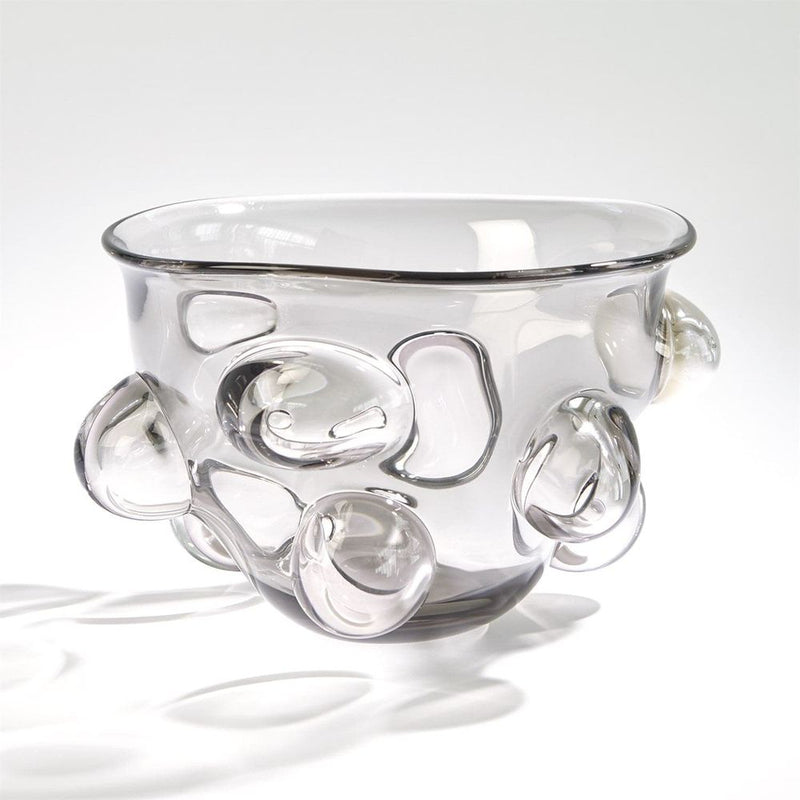 Bubbled Bowl, shown in smoke grey with glass and integrated bubble protrusions.