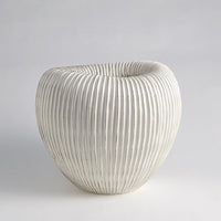 Additional view of Baleen Cachepot in ivory and off-white, featuring matte finish and open top vessel.