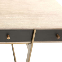 Additional view of Poseidon Desk, featuring matte dark drawer faces, wood veneer, metal, and three integrated drawers.