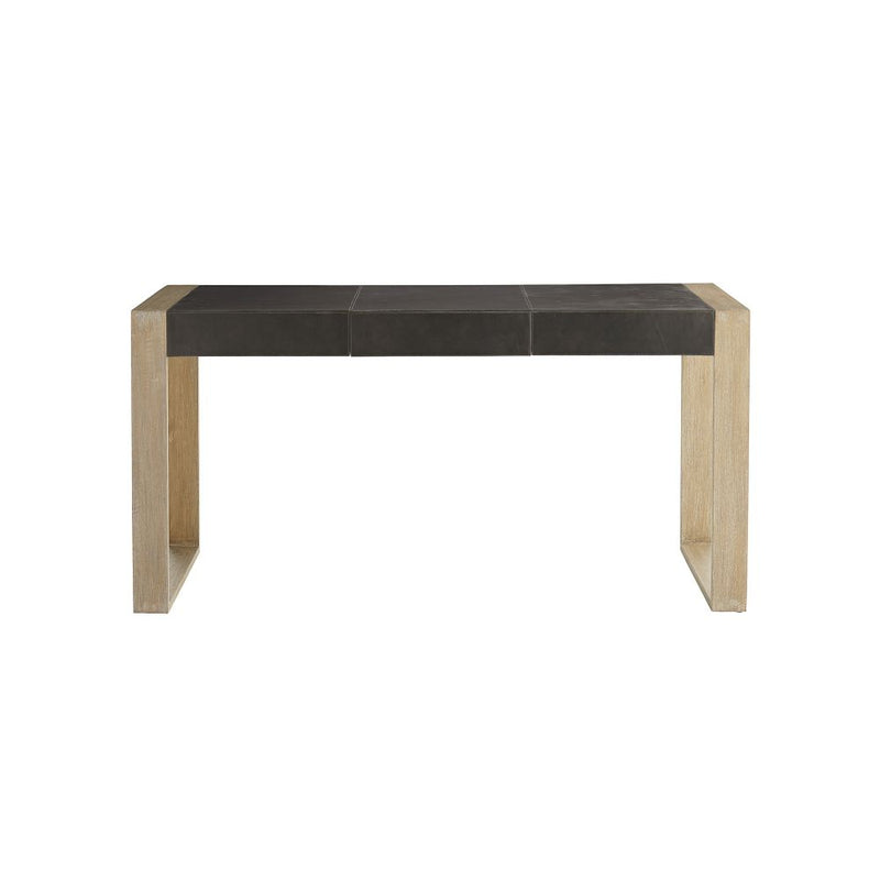 Hattie Desk, shown in charcoal gray and light natural oak with leather, solid oak, and three integrated front drawers.