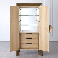 Additional view of Framed Tall Cabinet in white and antique brass, featuring double doors with centered circular pull.