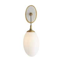 Quinn Sconce, shown in white and antique brass with marble, brass, and wall-mounting hardware.