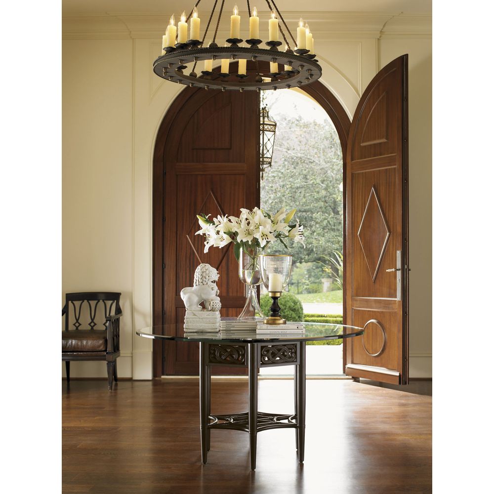 Sugar And Lace Dining Table With 54 Inch Glass Top, shown in dark bronze and clear with glass and metal.
