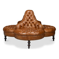Lobby Sofa Cuba Brown, shown in cognac brown and caramel tan with leather, wood, and radial multi-directional seating.