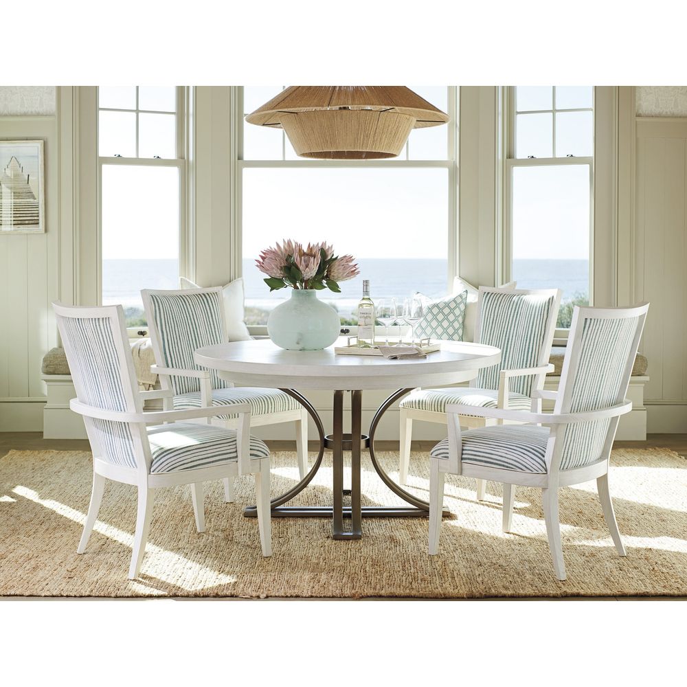 Alternate view of Savannah Round Dining Table, featuring light wire-brushed grain, wood, metal, and a round pedestal base.