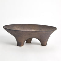 Opus Triple Leg Bowl, shown in bronze-brown and cream-white with ceramic, stoneware, and a tripod leg base.