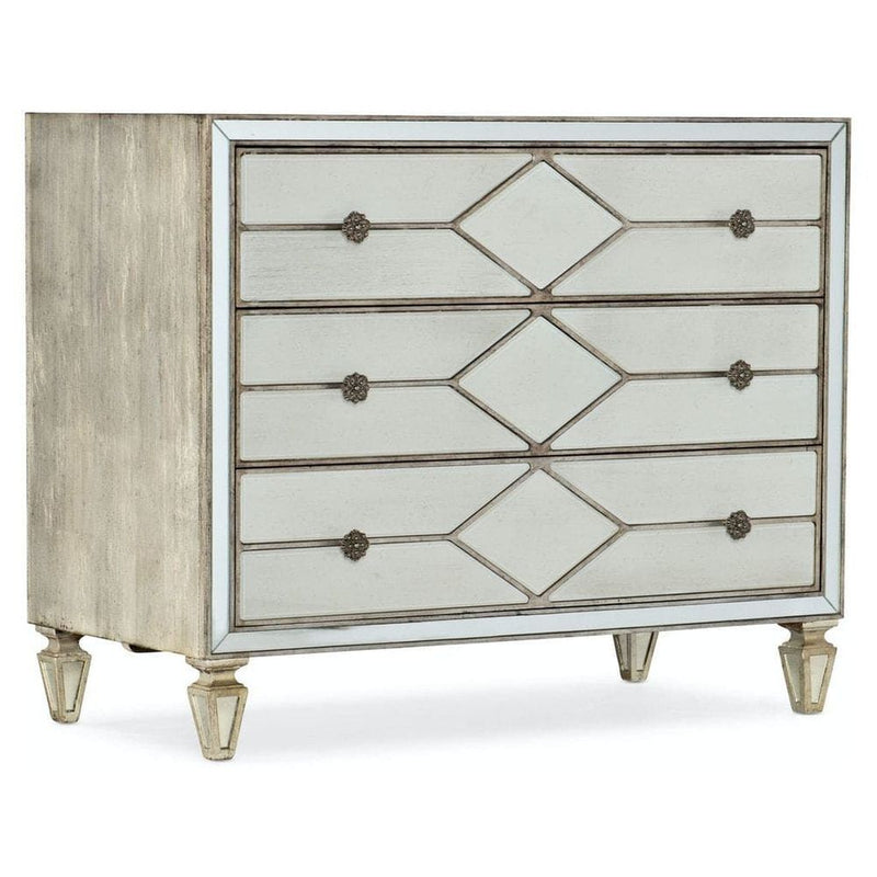Bachelorette Chest, shown in ivory and champagne with wood, mirror, and three full-width drawers.