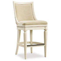 Sand Barstool, shown in ivory and cream with wood, fabric, and a swivel seat.