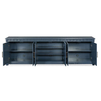 Additional view of Wilshire Cabinet, featuring brushed brass hardware, wood, metal, and six paneled cabinet doors.