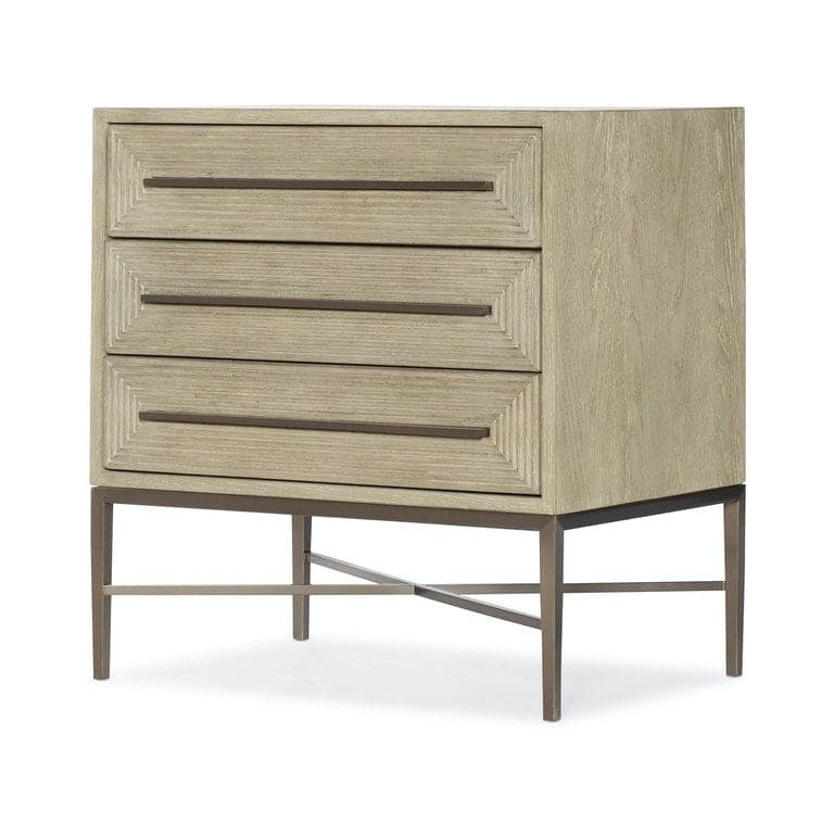 Cascade Three-Drawer Nightstand, shown in light taupe and warm gray with wood, metal, and three stacked drawers.