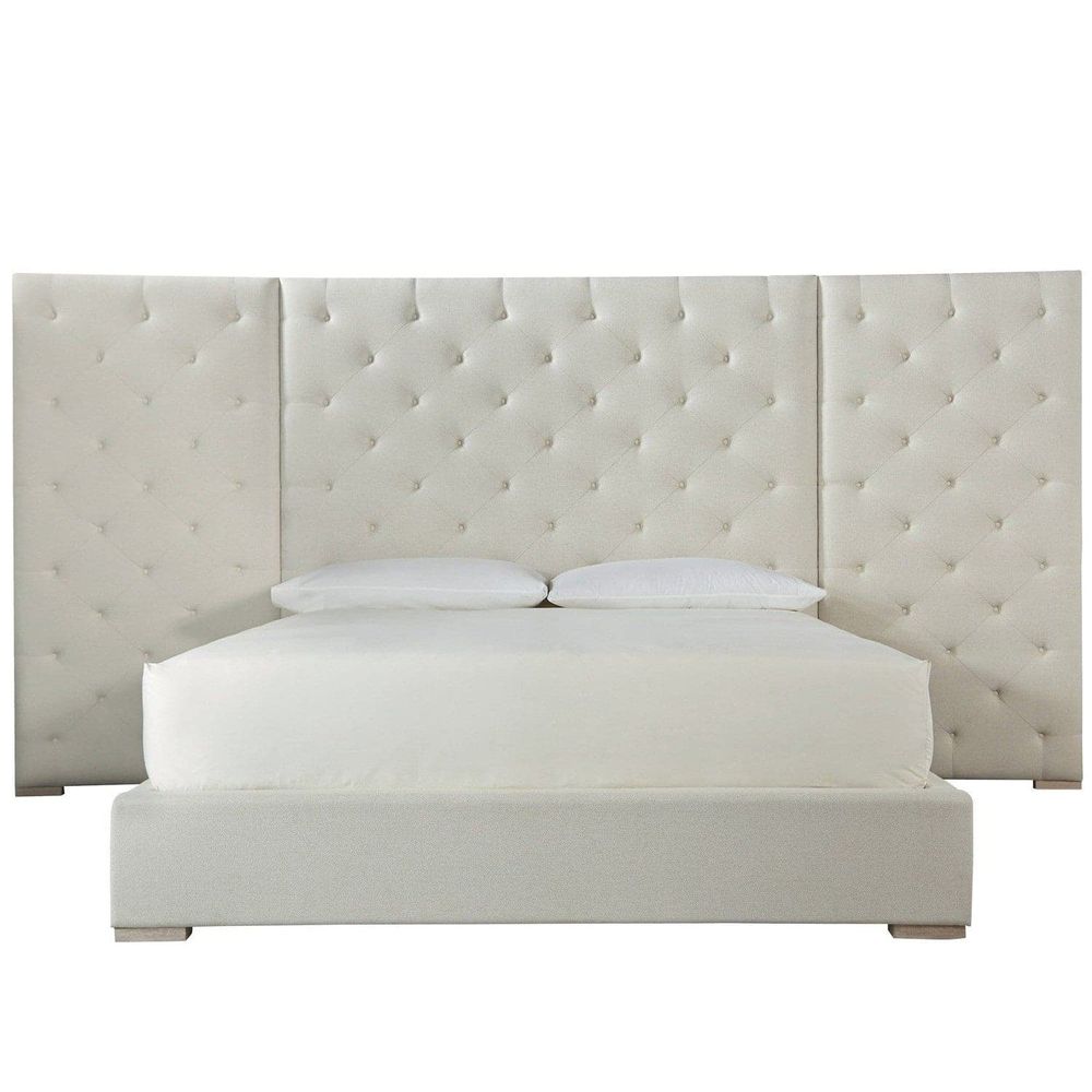 Brando King Bed With Panels, shown in ivory and cream with upholstery fabric, wood, and extended multi-panel headboard.