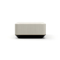 Additional view of Madera Plinth Cocktail Table in light beige and black, featuring matte finish and integrated stone insert.