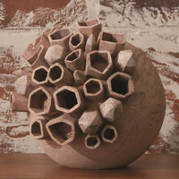 Alternate view of Chelsea Sculpture, featuring matte finish, ceramic, clay, and hollow tubular openings.