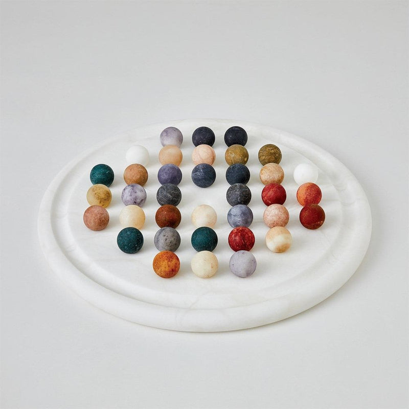 Alabaster Solitaire Game Set, shown in white and multicolor earth tones with alabaster and stone.