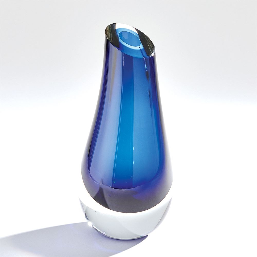 Additional view of Slant Vase in smoky amber-brown and cobalt blue, featuring polished finish and open top vessel.