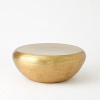 Additional view of Goa Cocktail Table in silver and gold, featuring hammered finish and a solid continuous drum base.