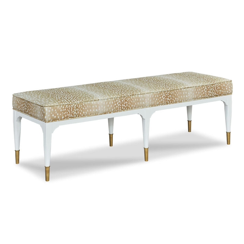 Juliet Bench, shown in beige and white with upholstery fabric, wood, and a backless armless upholstered seat.