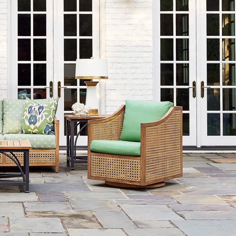 Alternate view of Jupiter Swivel Chair, featuring handwoven open-weave finish, teak, synthetic cane, and a swivel base.