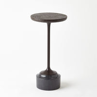 Croc Drinks Table, shown in dark brown and charcoal with metal, stone, and a pedestal base.
