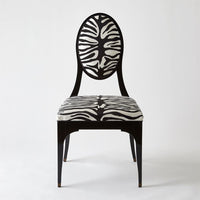 Harlow Zebra Dining Chair, shown in black and white with wood, fabric, and fixed armless frame.
