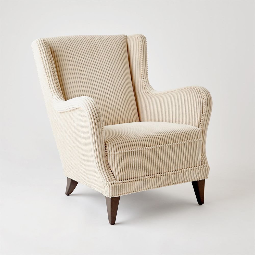 Additional view of Lounge Chair in cream and ivory, featuring ribbed textile finish and fixed arms.