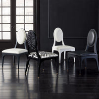 Alternate view of Harlow Zebra Dining Chair, featuring glossy lacquer, wood, fabric, and fixed armless frame.