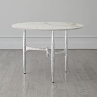 Additional view of Radius Round Table in white and silver, featuring polished stone finish and round tabletop.