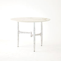 Radius Round Table, shown in white and silver with marble, metal, and round tabletop.