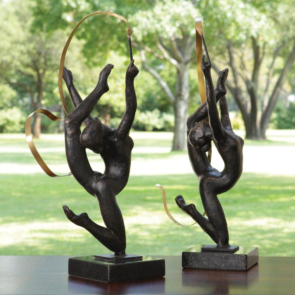 Alternate view of Ribbon Dancer, featuring matte textured finish, cast metal, brass, and a freestanding weighted square base.