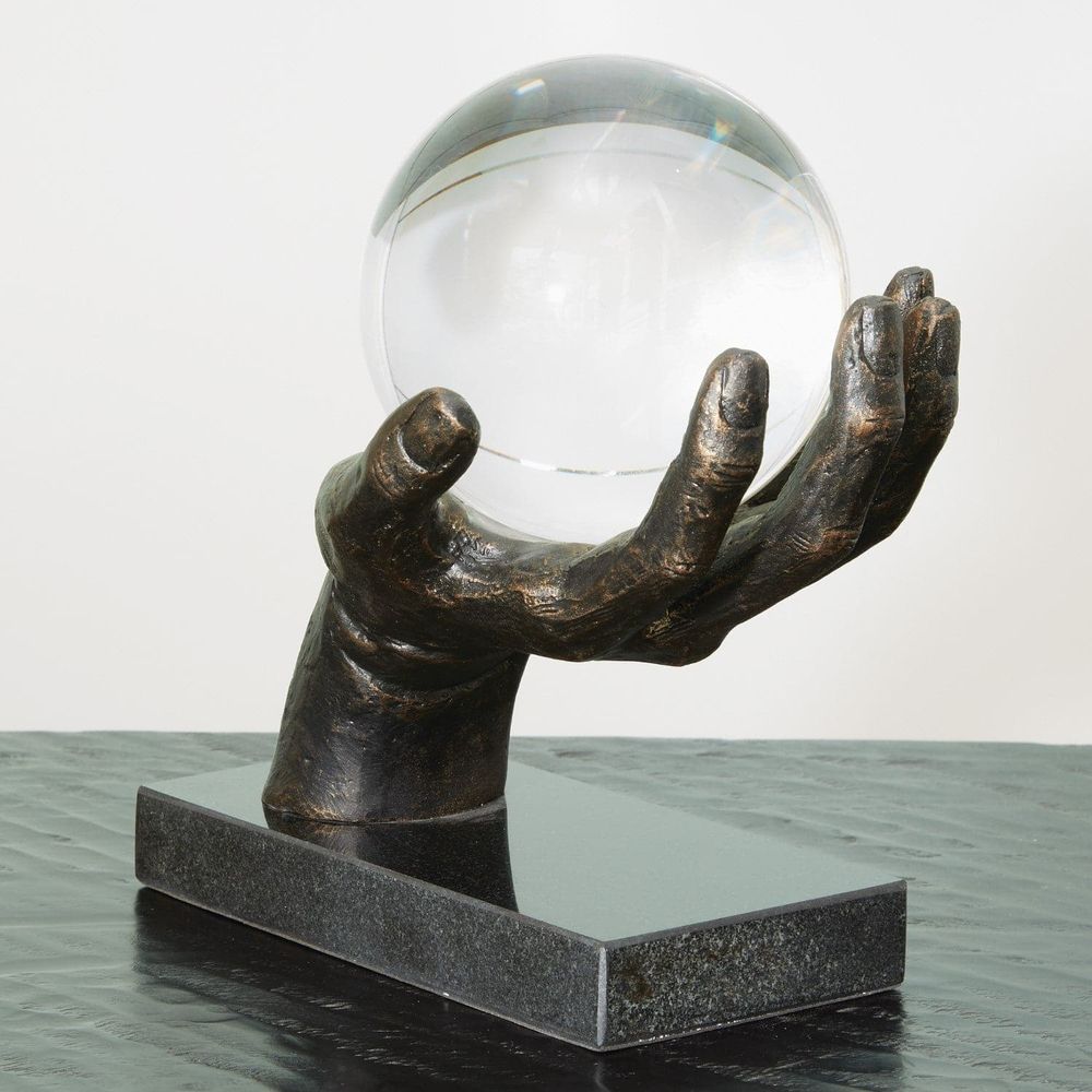 Alternate view of Into the Future, featuring honed stone finish, cast metal, crystal glass, and fixed sculptural base.