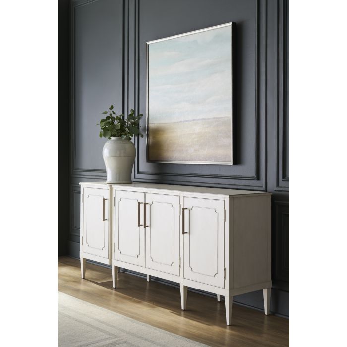 Alternate view of Camille Credenza in white and ivory with long low rectangular four-door cabinet on slender tapered legs.