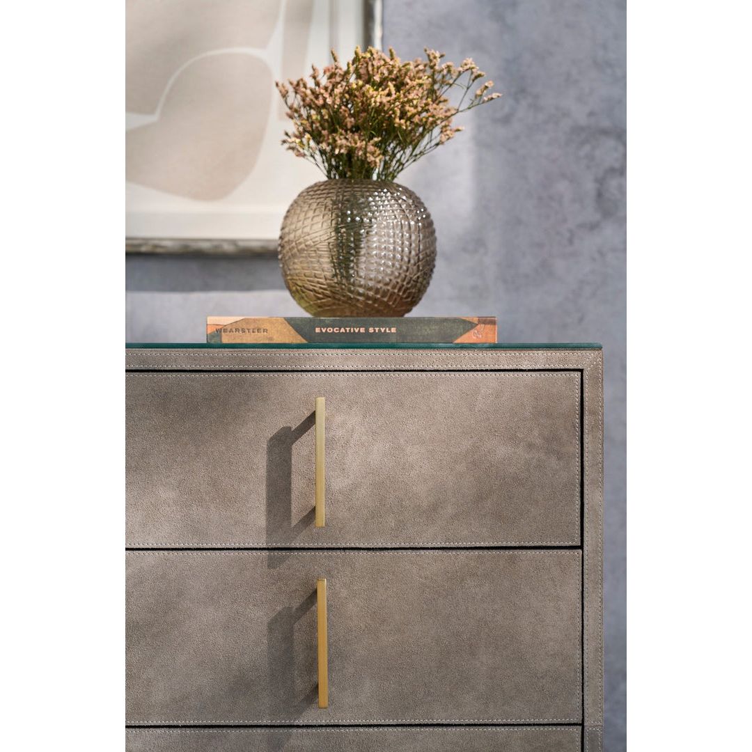 Additional view of Hyde Five Drawer Chest, showing rectangular boxy chest on low open metal sled base in taupe and greige.