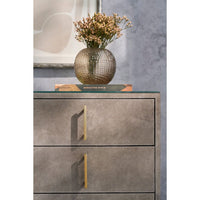 Additional view of Hyde Five Drawer Chest, showing rectangular boxy chest on low open metal sled base in taupe and greige.