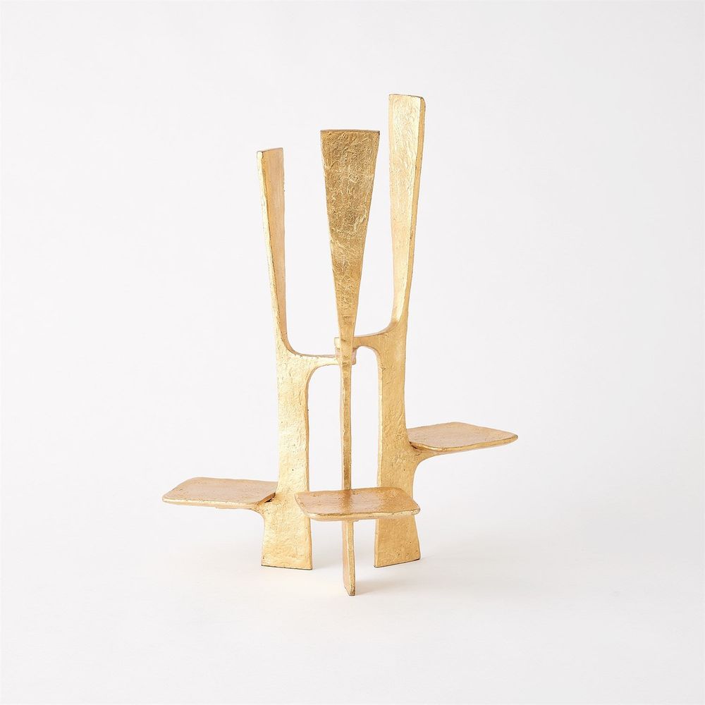 Triune Candleholder, shown in gold with metal, gold leaf, and three integrated staggered candle platforms.