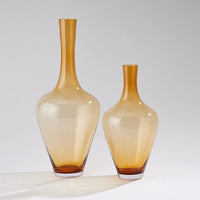 Ambrosia Vase-Caramel-Sm, shown in caramel amber and golden honey with blown glass and narrow neck opening.