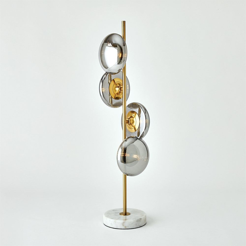 Stellar Table Lamp-Smoke/Brass, shown in brass gold and smoke gray with smoked glass and brass.