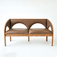 Arches Bench-Nutmeg/Champagne, shown in warm brown and medium oak tan with leather, wood, and fixed curved armrests.