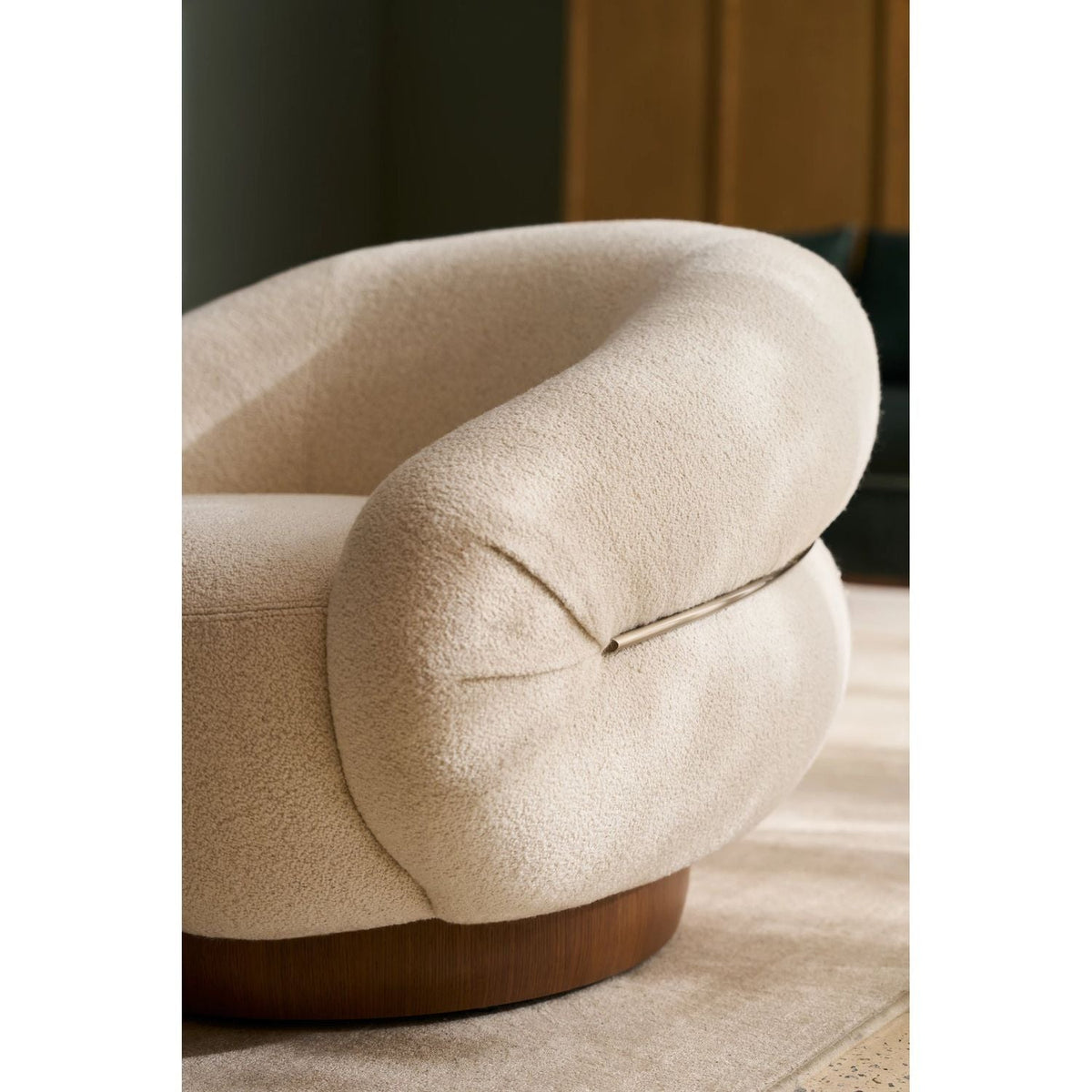 Alternate view of Smoosh Swivel Lounge Chair, featuring nubby textured upholstery, bouclé fabric, wood, and a swivel base.