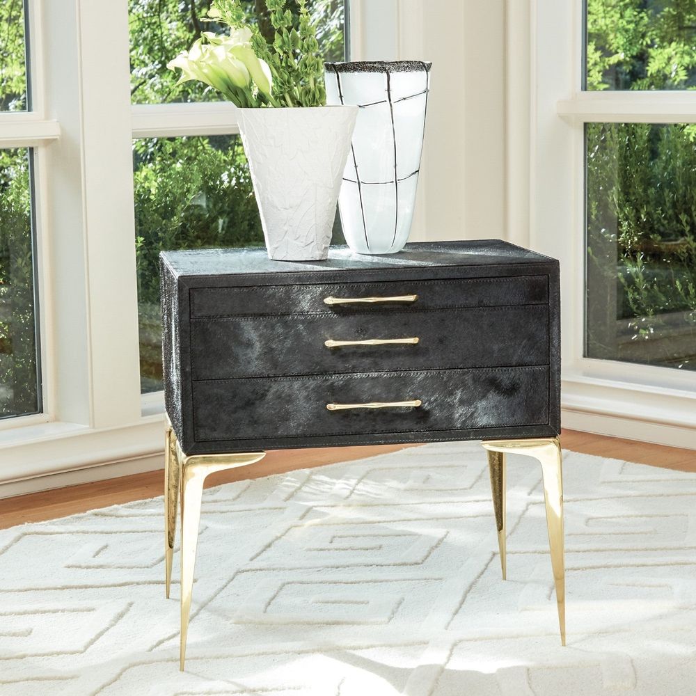 Additional view of Stiletto Bedside Table in ivory and black, featuring stitched edge detailing and three stacked drawers.