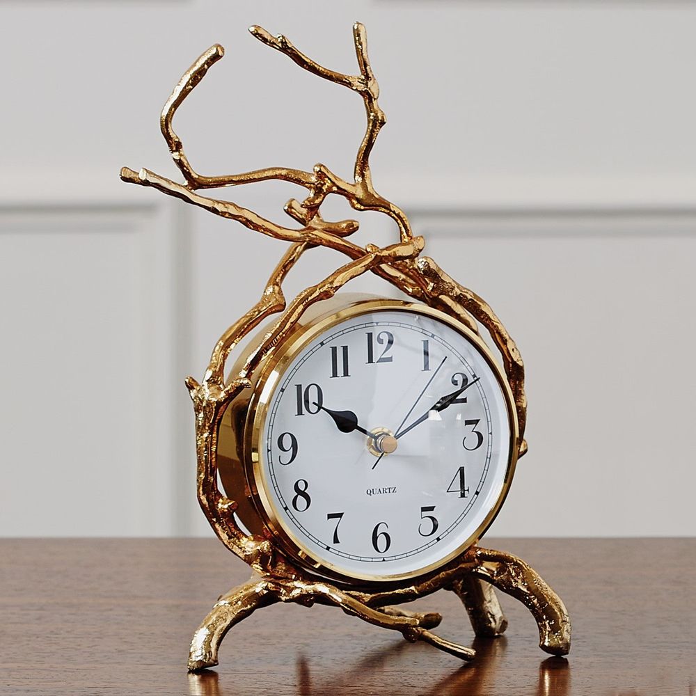Alternate view of Twig Clock in silver and gold.